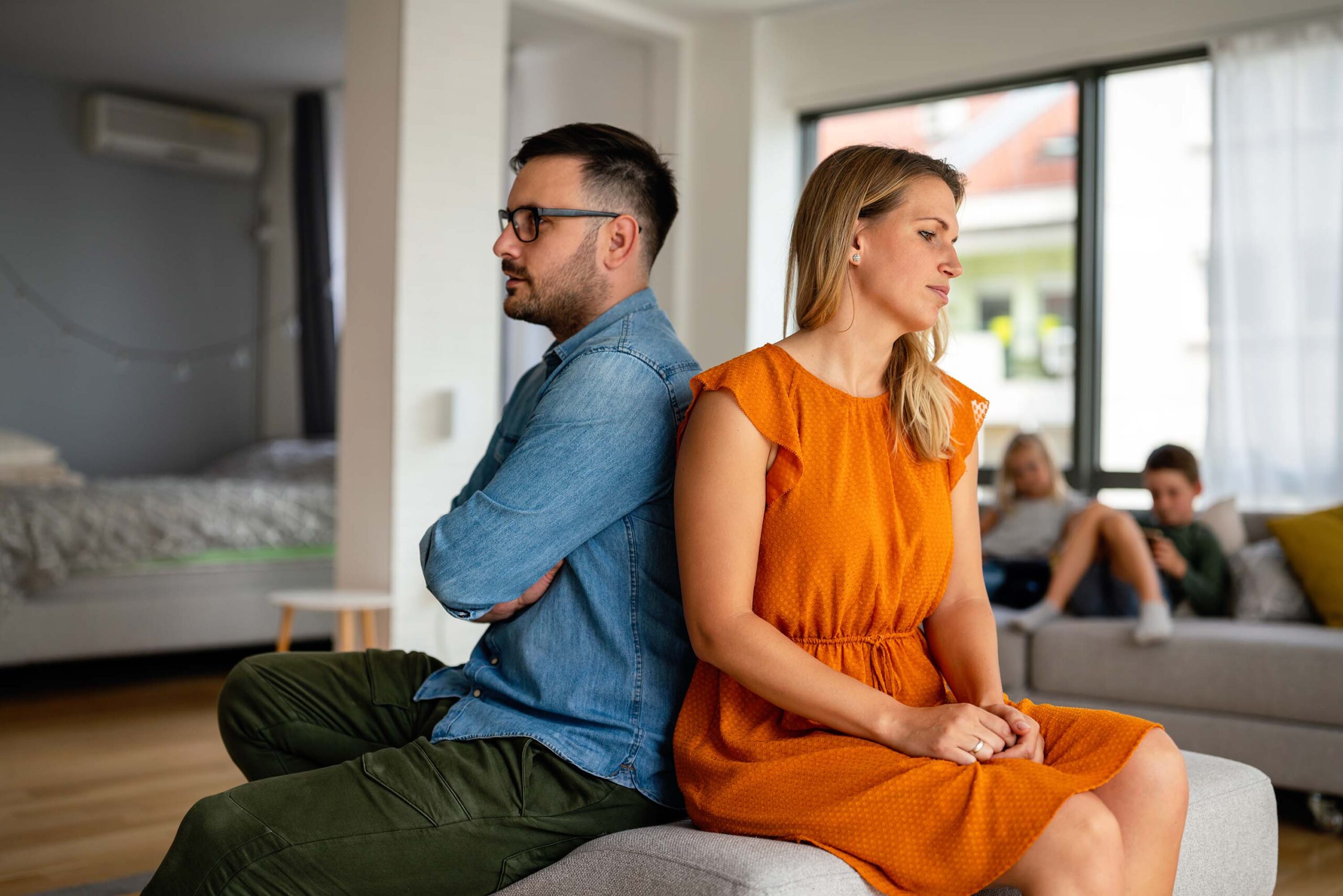 man and woman back to back